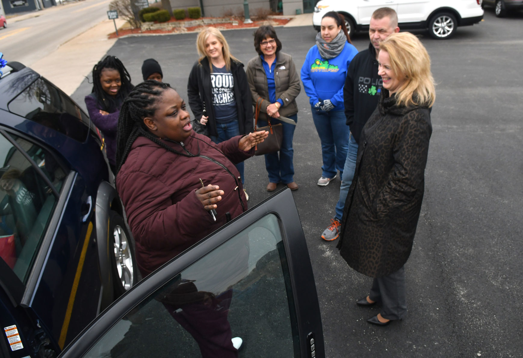 Moline police and Moline Municipal Credit Union give car away